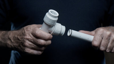 Speedfit Tee being connected to speedfit pipe