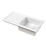 White kitchen sink with drainboard on a white background