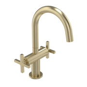 brushed brass basin tap on white background